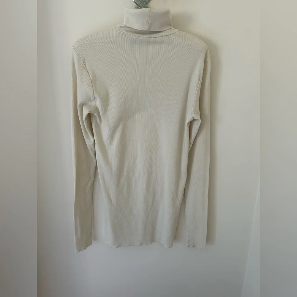 Vintage Ralph Lauren Ribbed Knit Turtleneck Sweater in Cream
Size: Large
EUC - Picture 8 of 10